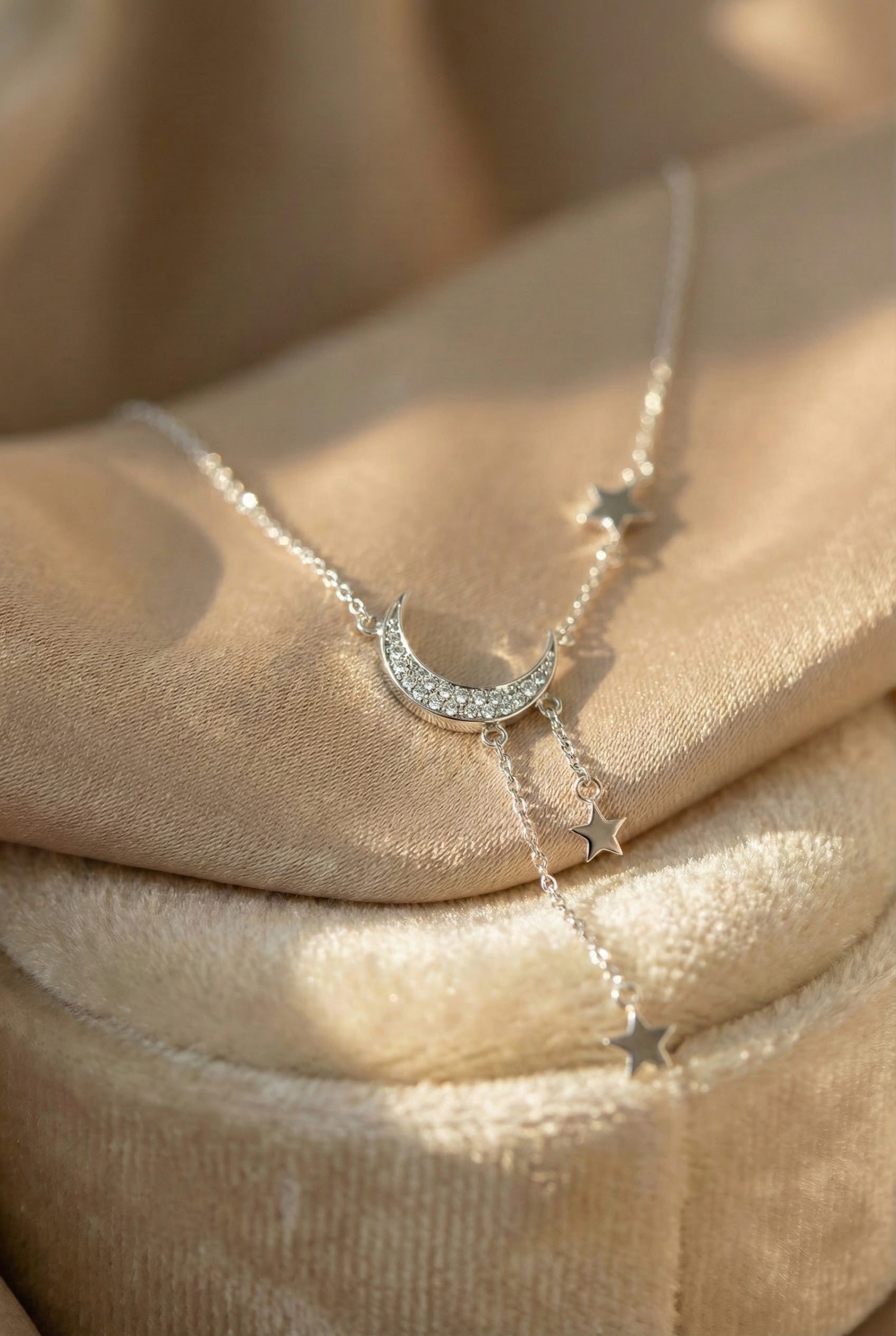 Chic Silver Necklace Featuring Moon and Star Design