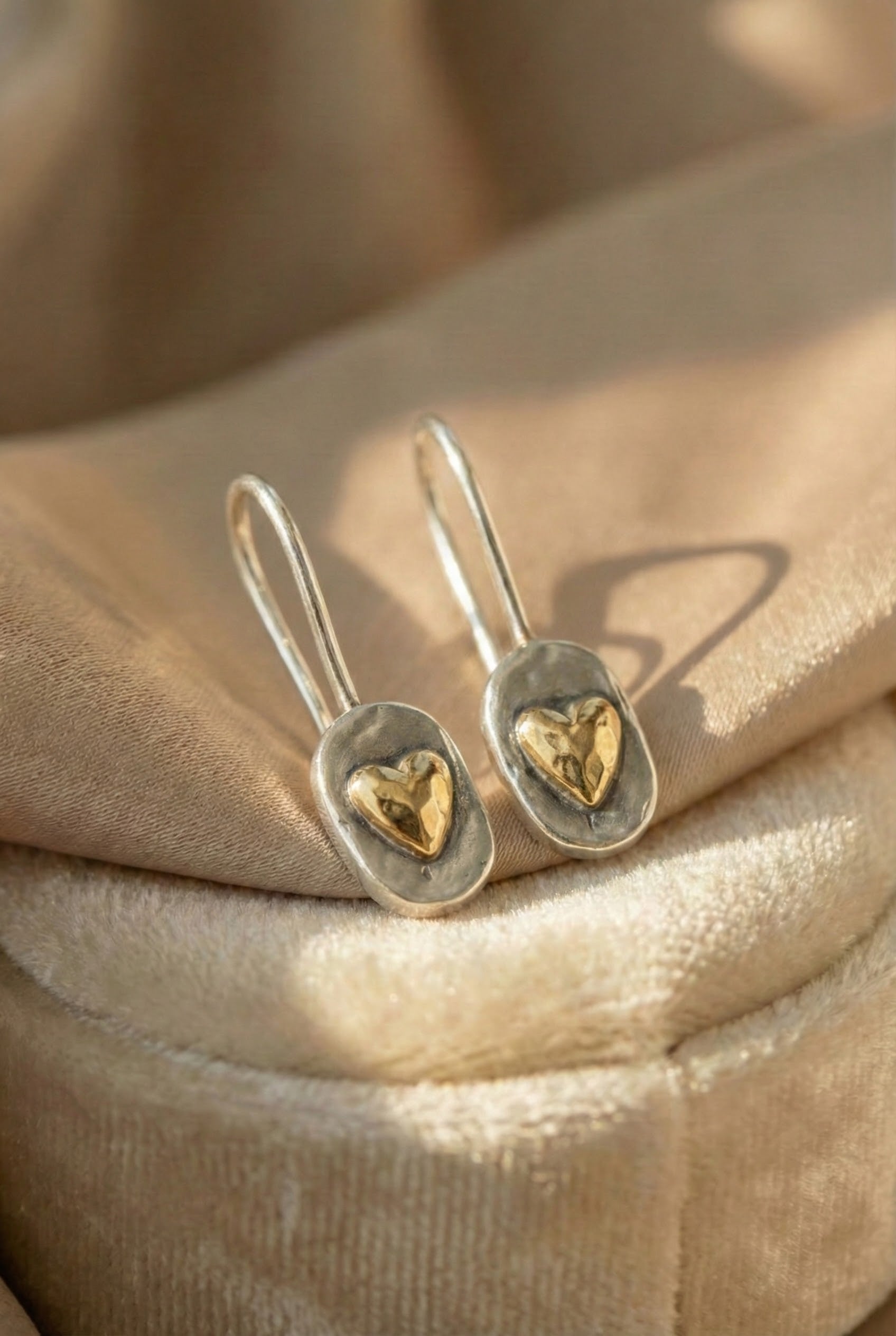Silver and Gold Heart-Shaped Earrings