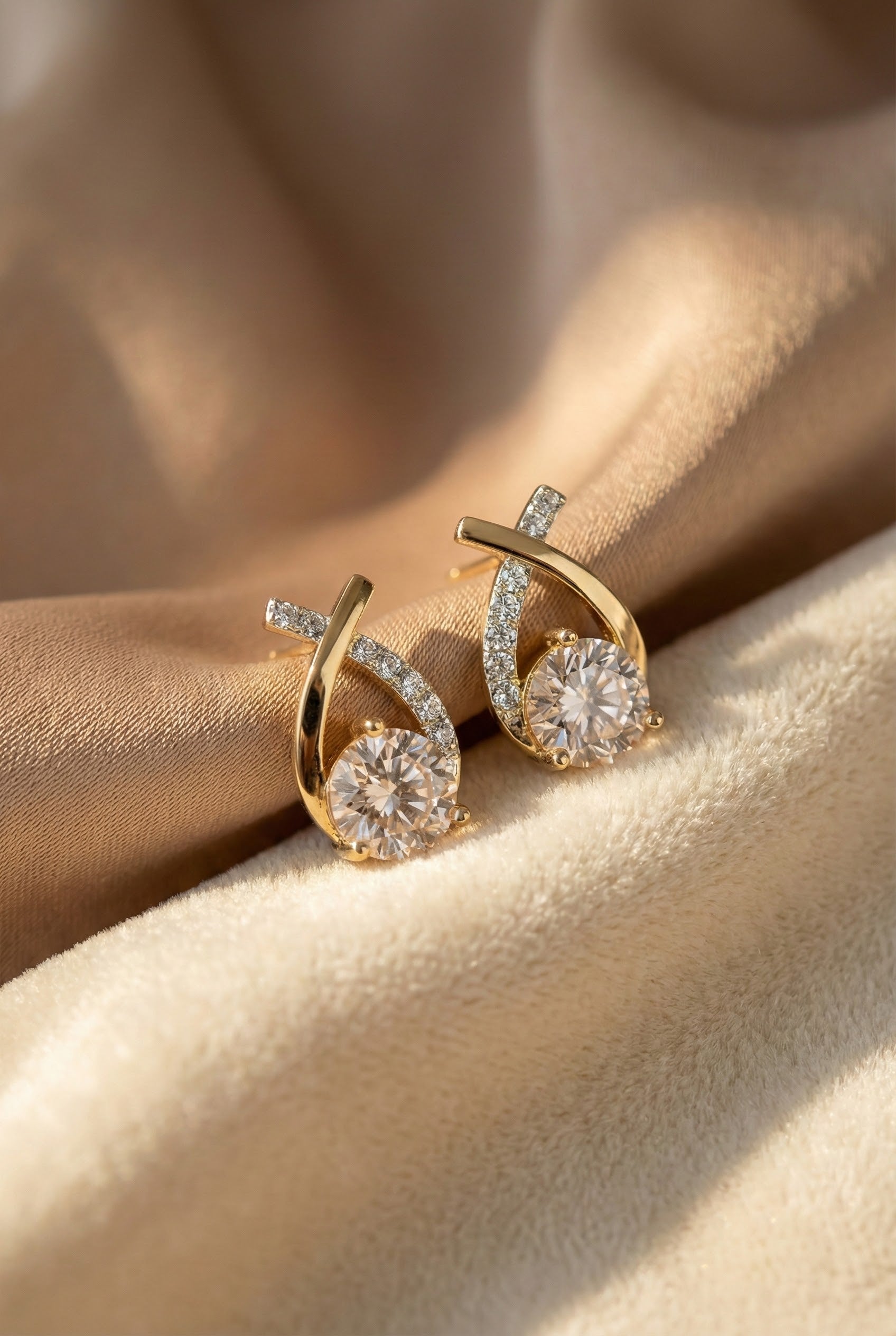 Zirconia Stud Earrings with Golden Cross Design