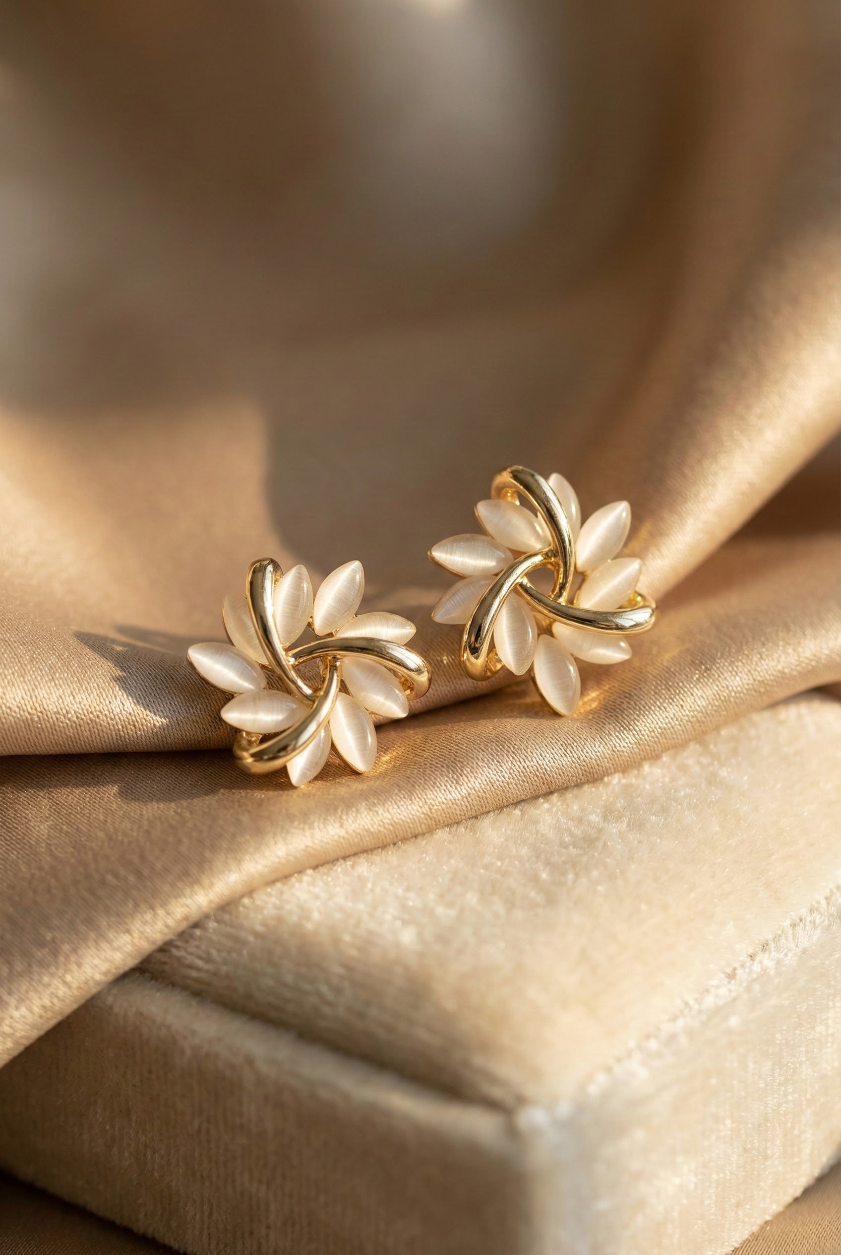 White Opal Stud Earrings with Gold Leaf Accents