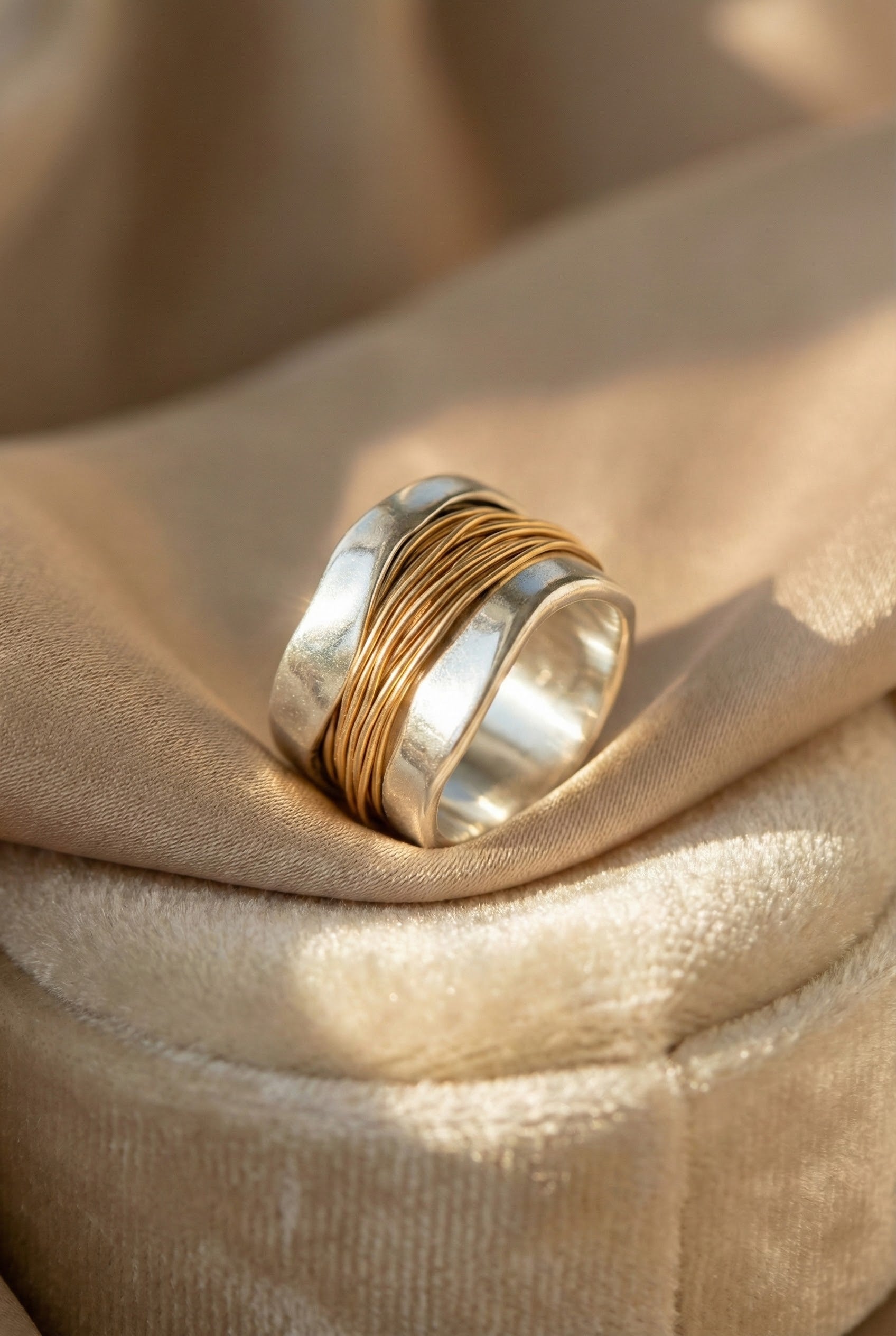 Silver Ring with Golden Thread Design